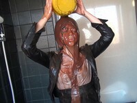 Office lady covered in chocolate lotion