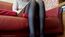 [Legs / feet fetish] model takes off dress and black tights on the couch legs
