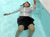 Playing at a pool with suit 2